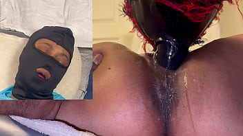 Ebony beauty soaks a dildo mask with her explosive squirt in a wet, messy climax