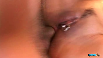 Voluptuous golden-haired Asian siren swallows his massive pale shaft whole before taking a savage pounding in her tight backdoor.