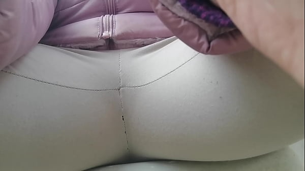 Witness Nicoletta’s scandalous public park yoga pants soaking spectacle—dare to watch?