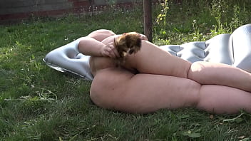 Plump and pierced, she struts through the garden, working that fat plug deep in her hungry ass before bouncing her thick cheeks for the sun.