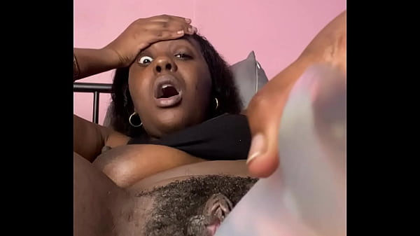 Ebony beauty spreads her sweet, creamy pussy wide in a steamy solo show