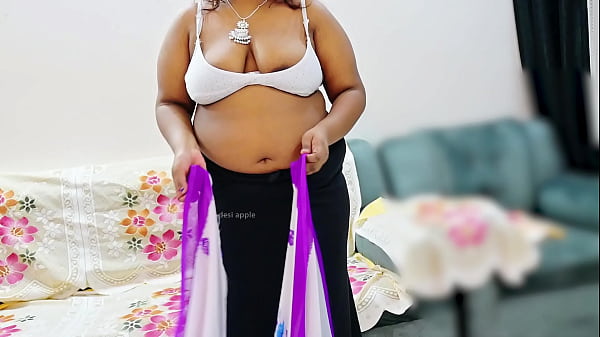 Indian Bhabhi In A Saree, Curves Teasing Through The Fabric, Ready To Be Unwrapped