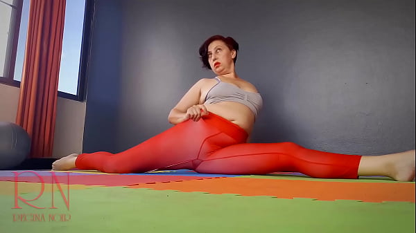 Sexy Yoga Babe In Tight Red Leotard – Regina Noir Bends Deep, Teasing With Every Flexible Move.