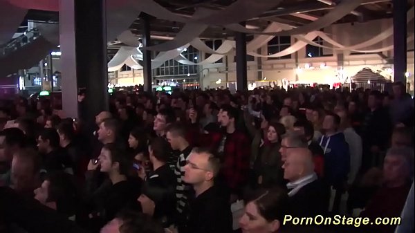 Watch Two Horny Lesbians Put On A Filthy Sex Show For A Crowd On A Public Stage